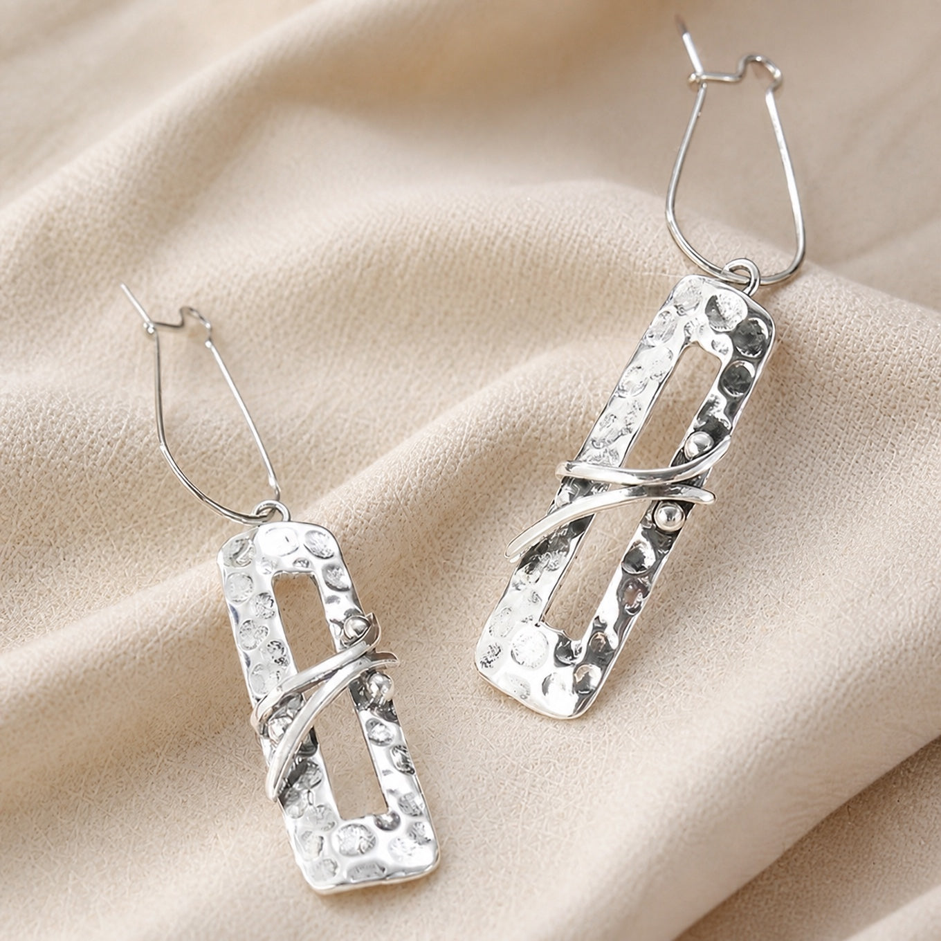 Elongated Silver Rustic Earrings