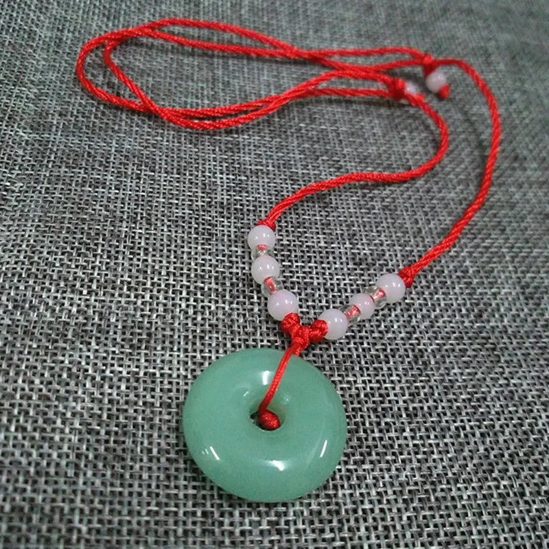 Graceful Jade Disc Pendant
